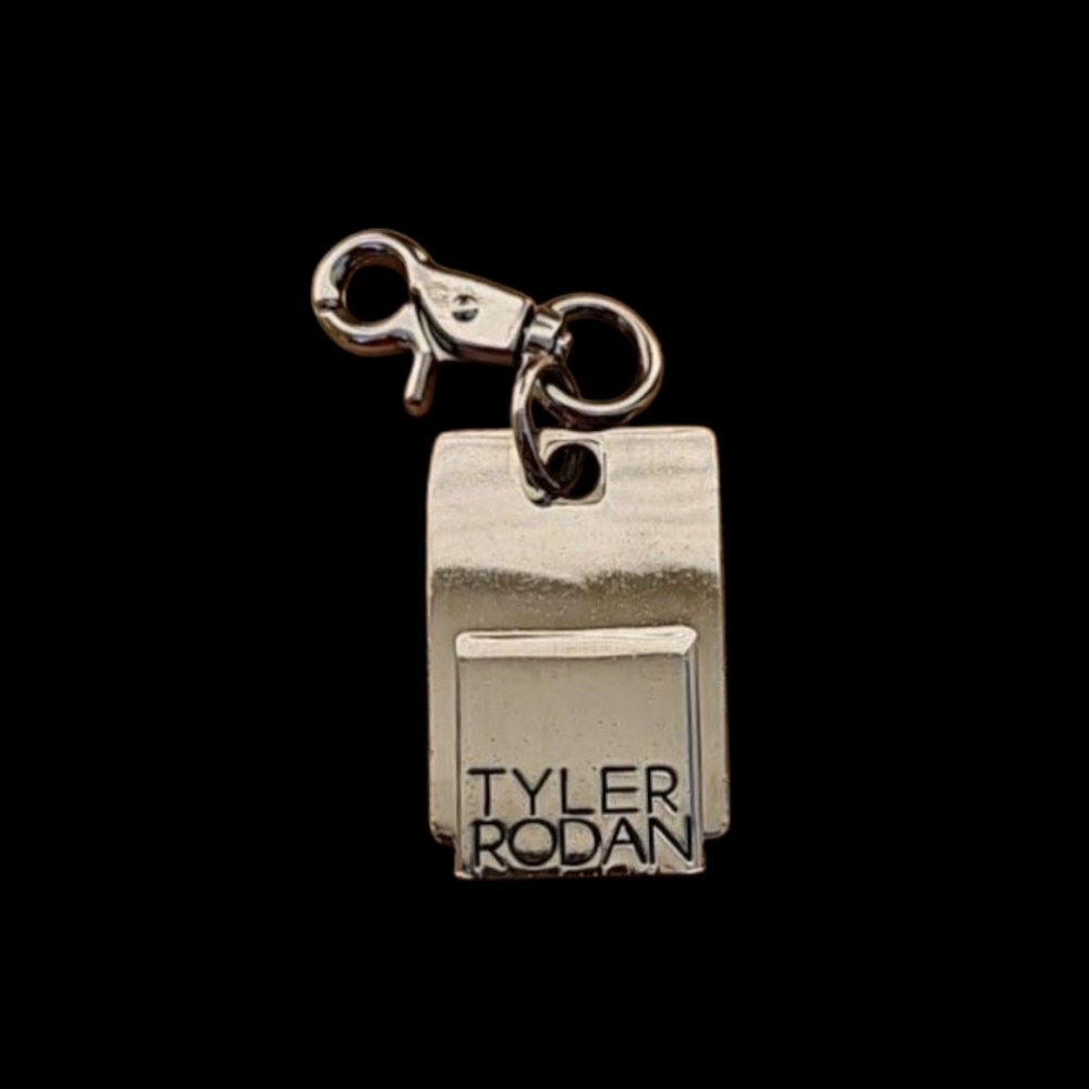 Tyler Rodan Designer Silver Tone Hanging Logo Purse Charm Hook Key Chain.